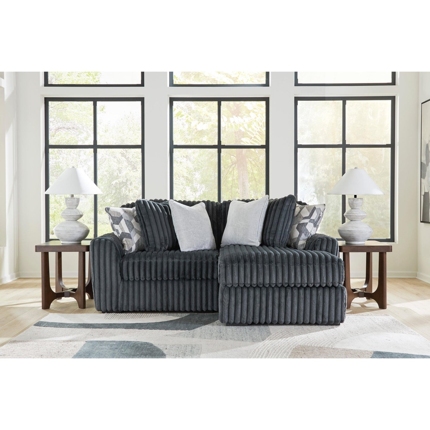 Signature Design by Ashley Midnight - Madness 98105S16 2 pc Sectional with Chaise - American Furniture of Slidell