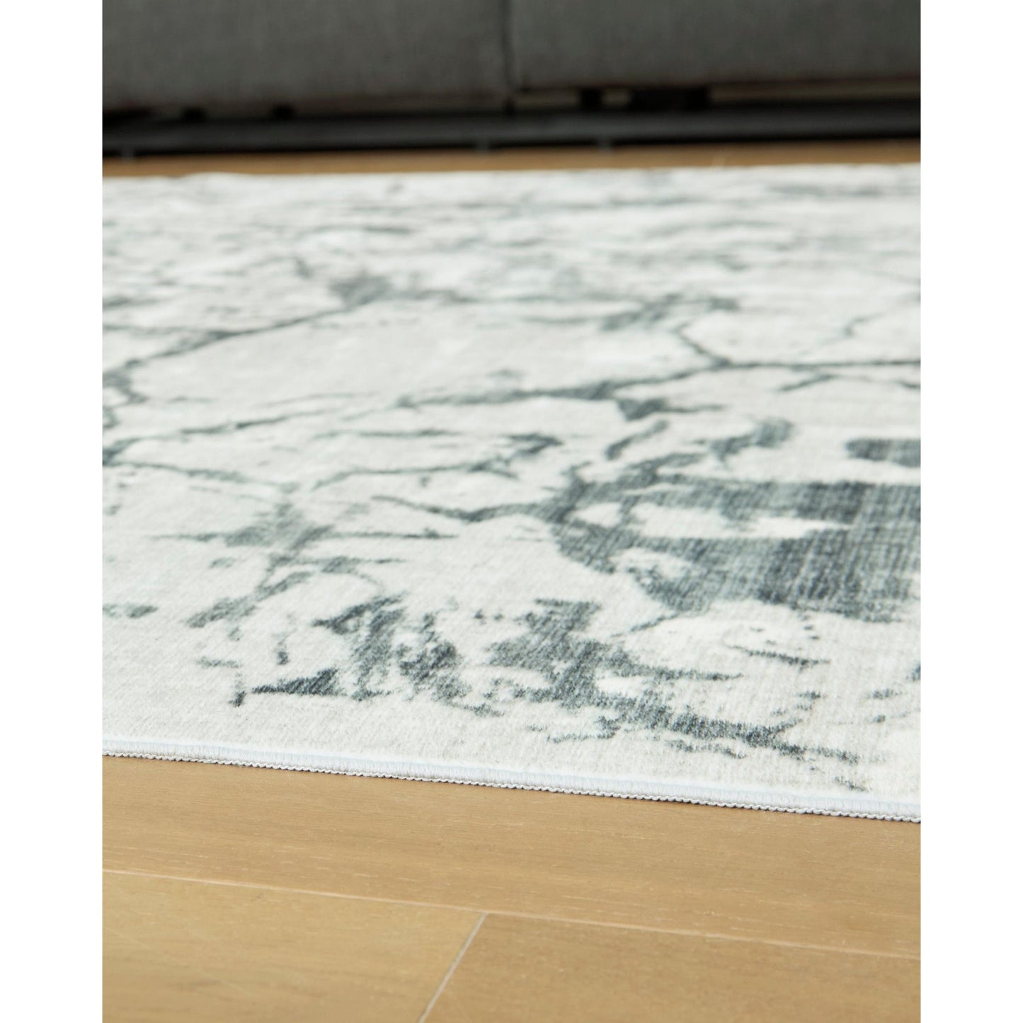 Signature Design by Ashley Tobinbury R407421 Washable Large Rug - American Furniture of Slidell