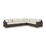  Signature Design by Ashley Kimora P711P2 4 pc Outdoor Sectional IMAGE 1