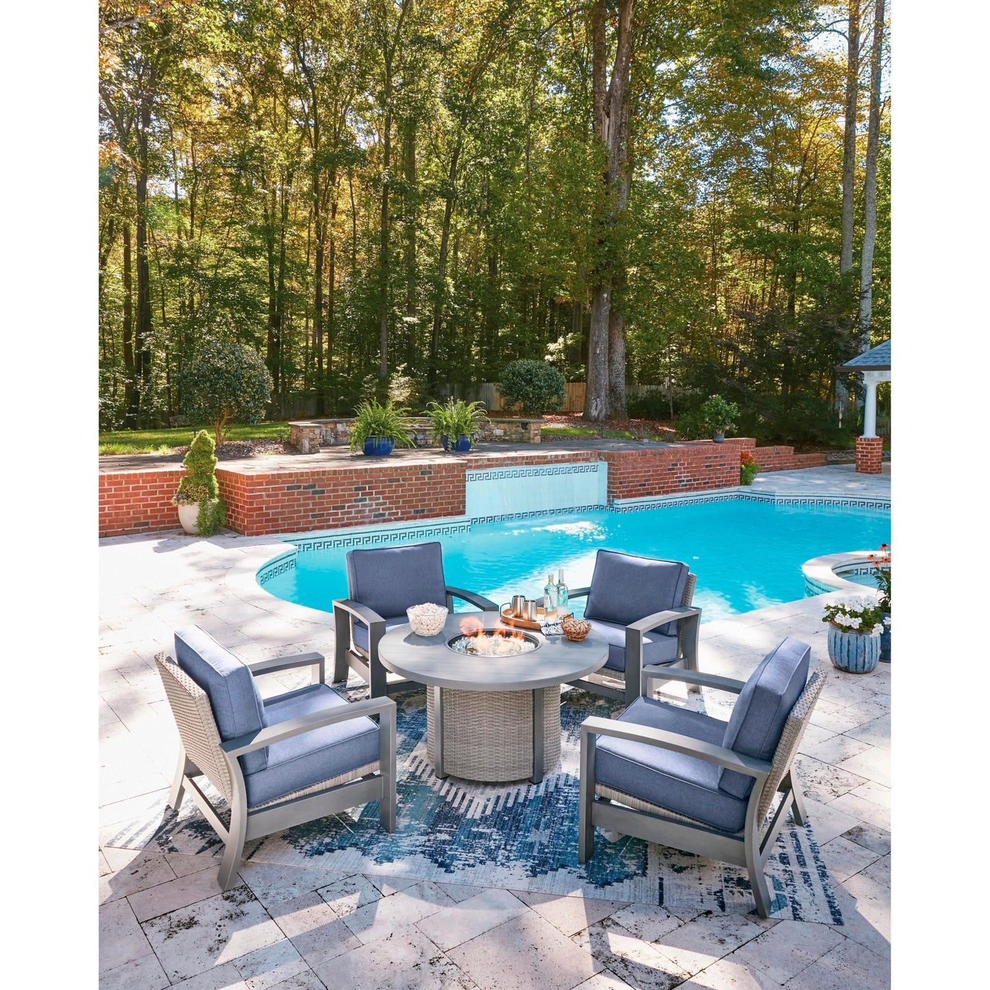 Signature Design by Ashley Half Moon Beach PCP418 - 776 Round Fire Pit Table - American Furniture of Slidell
