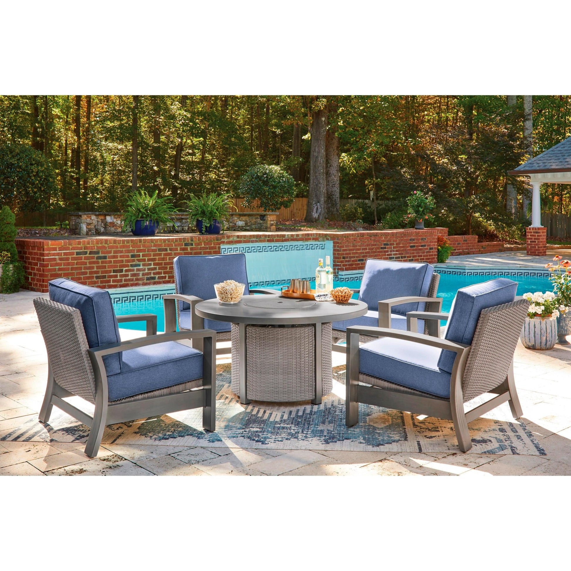 Signature Design by Ashley Half Moon Beach PCP418 - 776 Round Fire Pit Table - American Furniture of Slidell