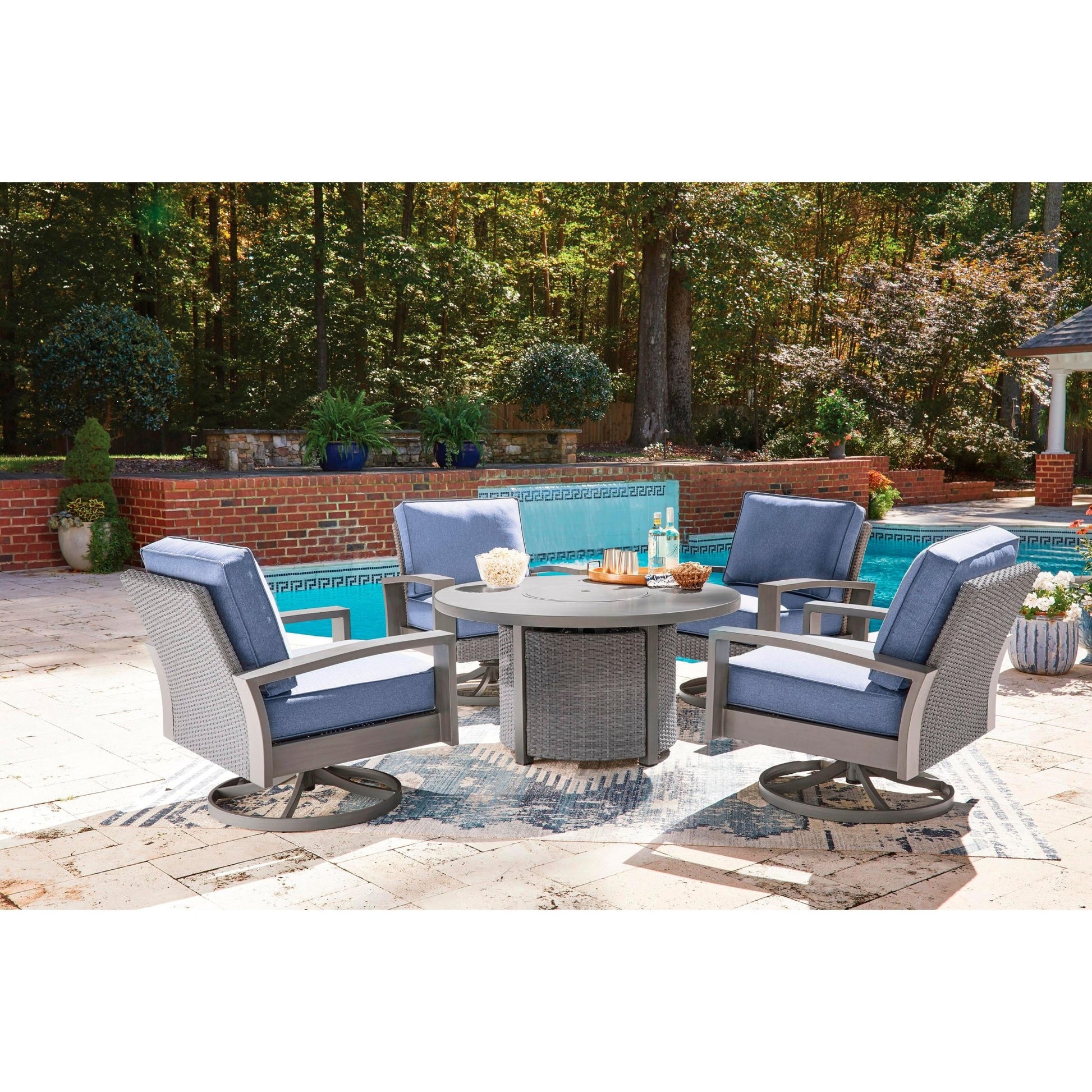 Signature Design by Ashley Half Moon Beach PCP418 - 821 Swivel Lounge with Cushion - American Furniture of Slidell