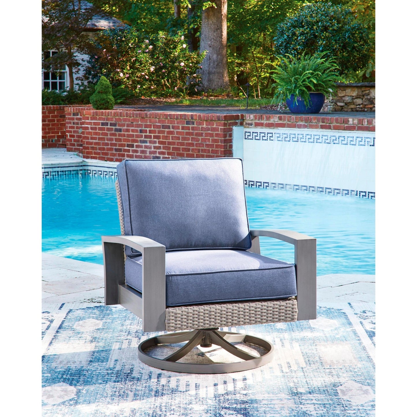 Signature Design by Ashley Half Moon Beach PCP418 - 821 Swivel Lounge with Cushion - American Furniture of Slidell