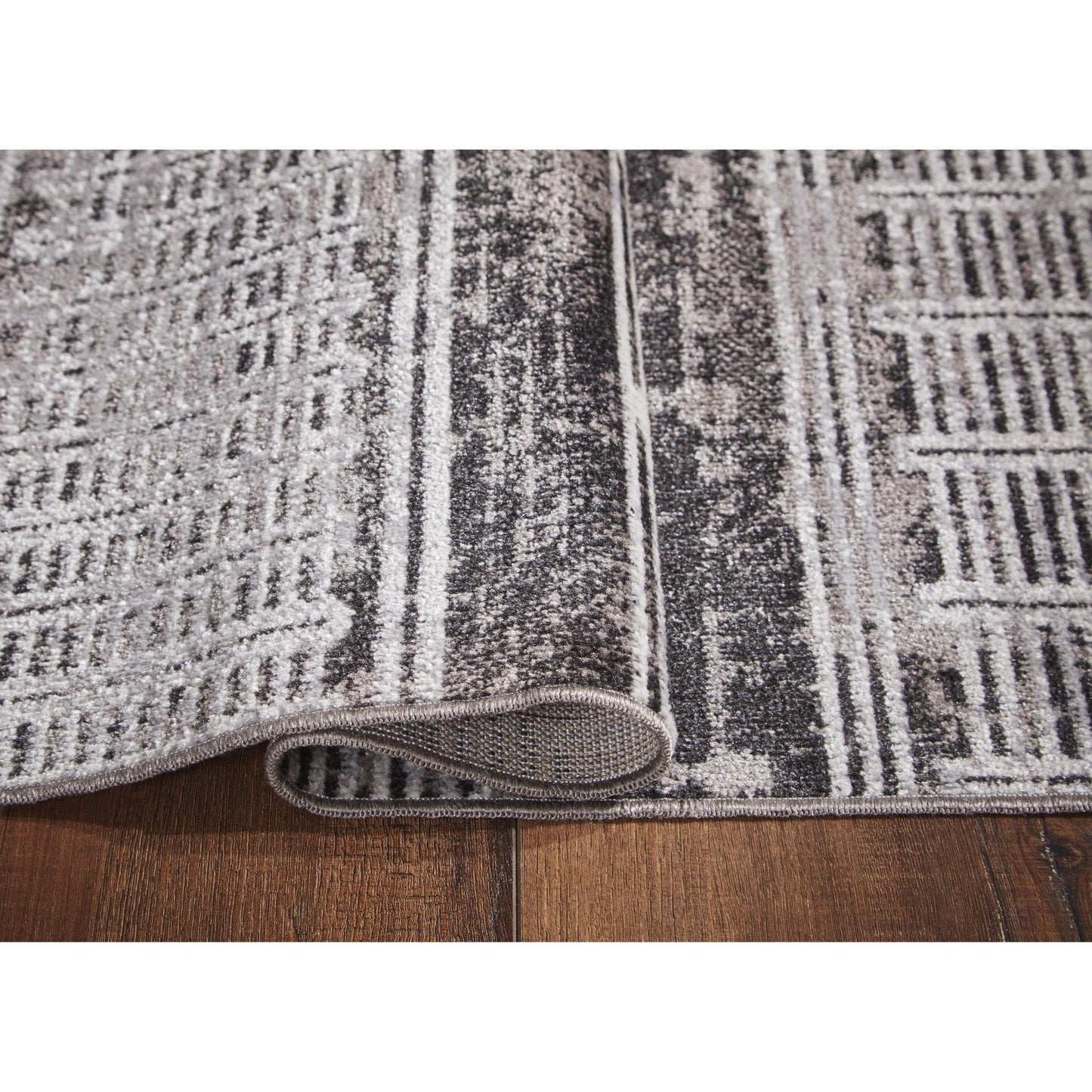 Signature Design by Ashley Henchester R405991 Washable Large Rug - American Furniture of Slidell