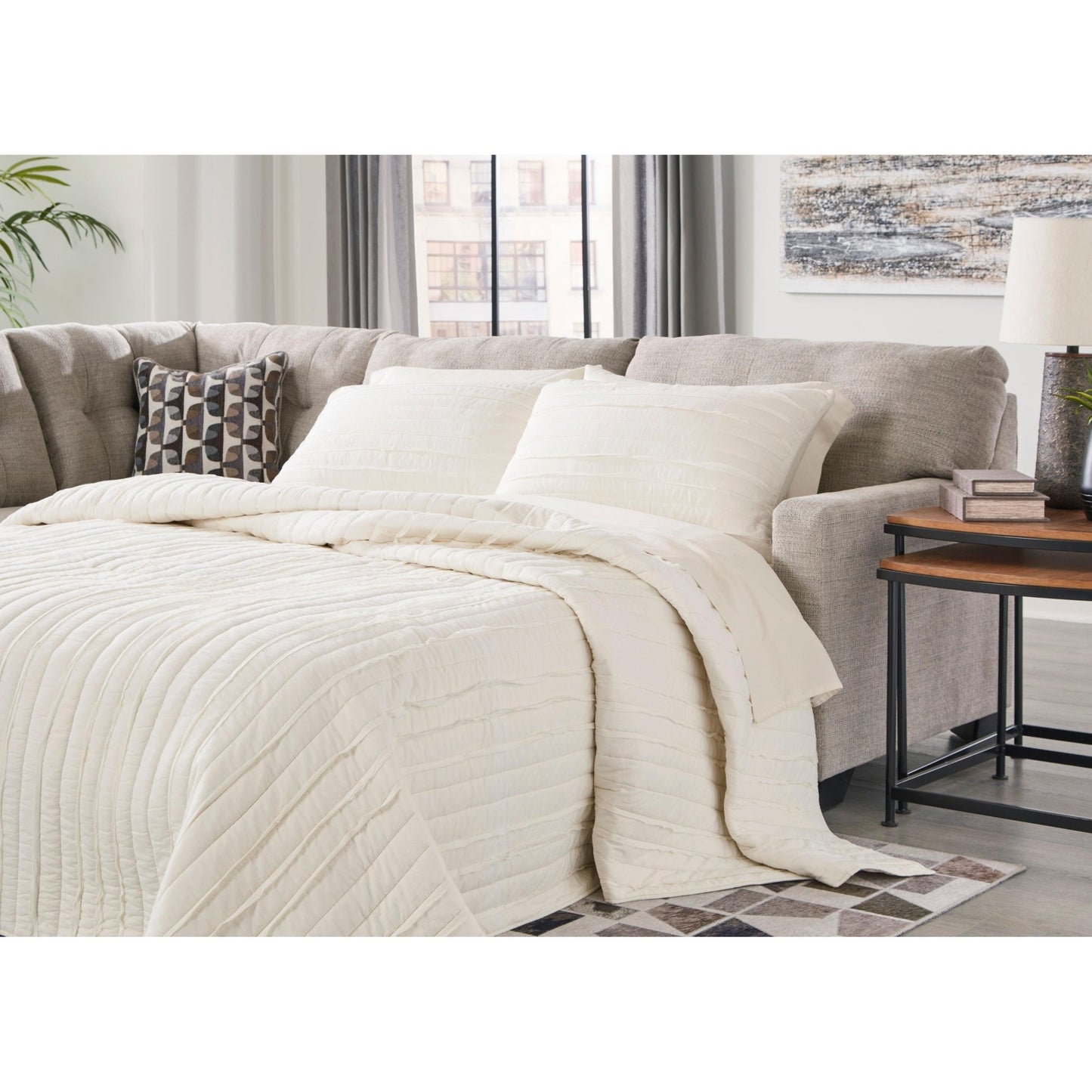 Signature Design by Ashley Mahoney 31004S3 2 pc Sleeper Sectional with Chaise - American Furniture of Slidell