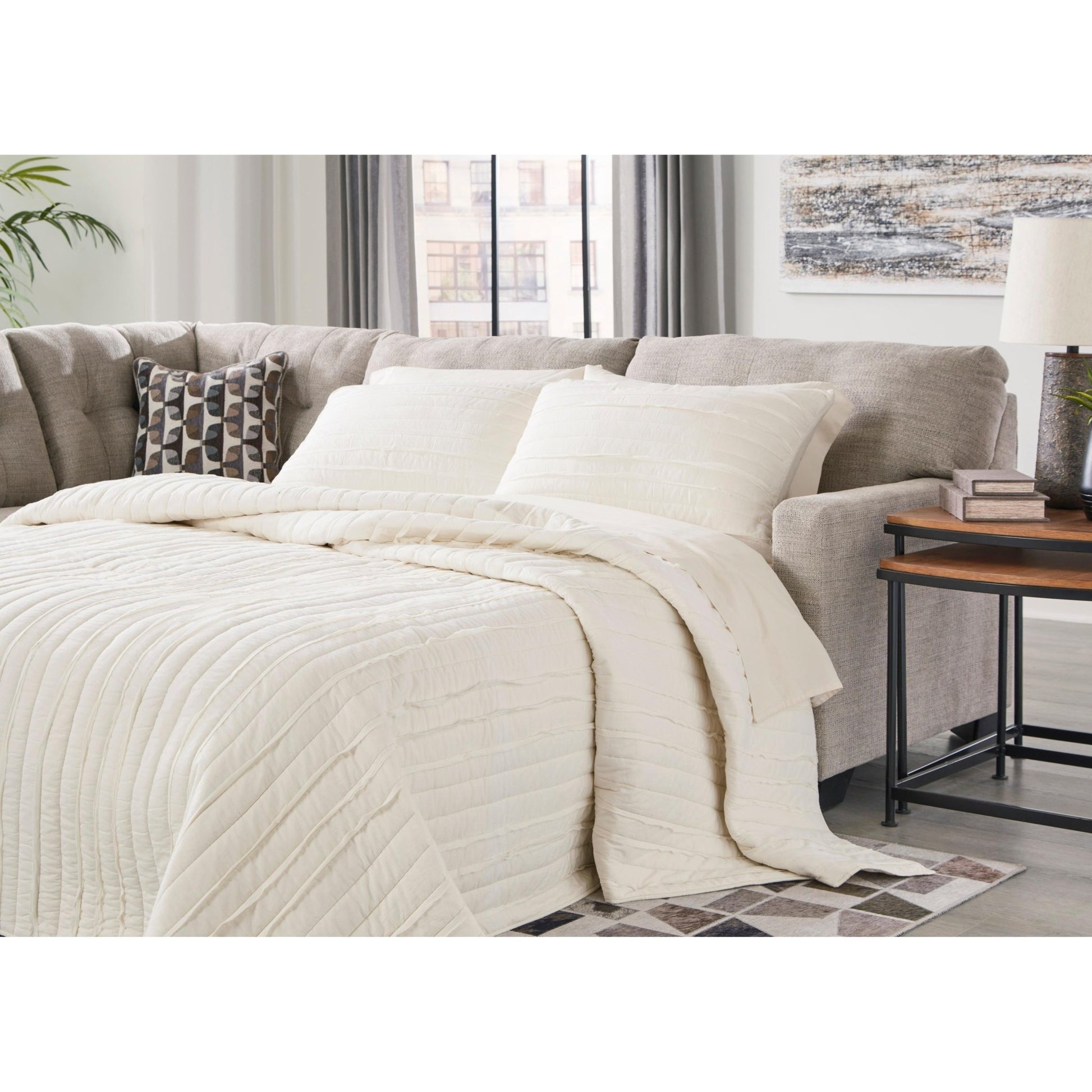 Signature Design by Ashley Mahoney 31004S3 2 pc Sleeper Sectional with Chaise - American Furniture of Slidell