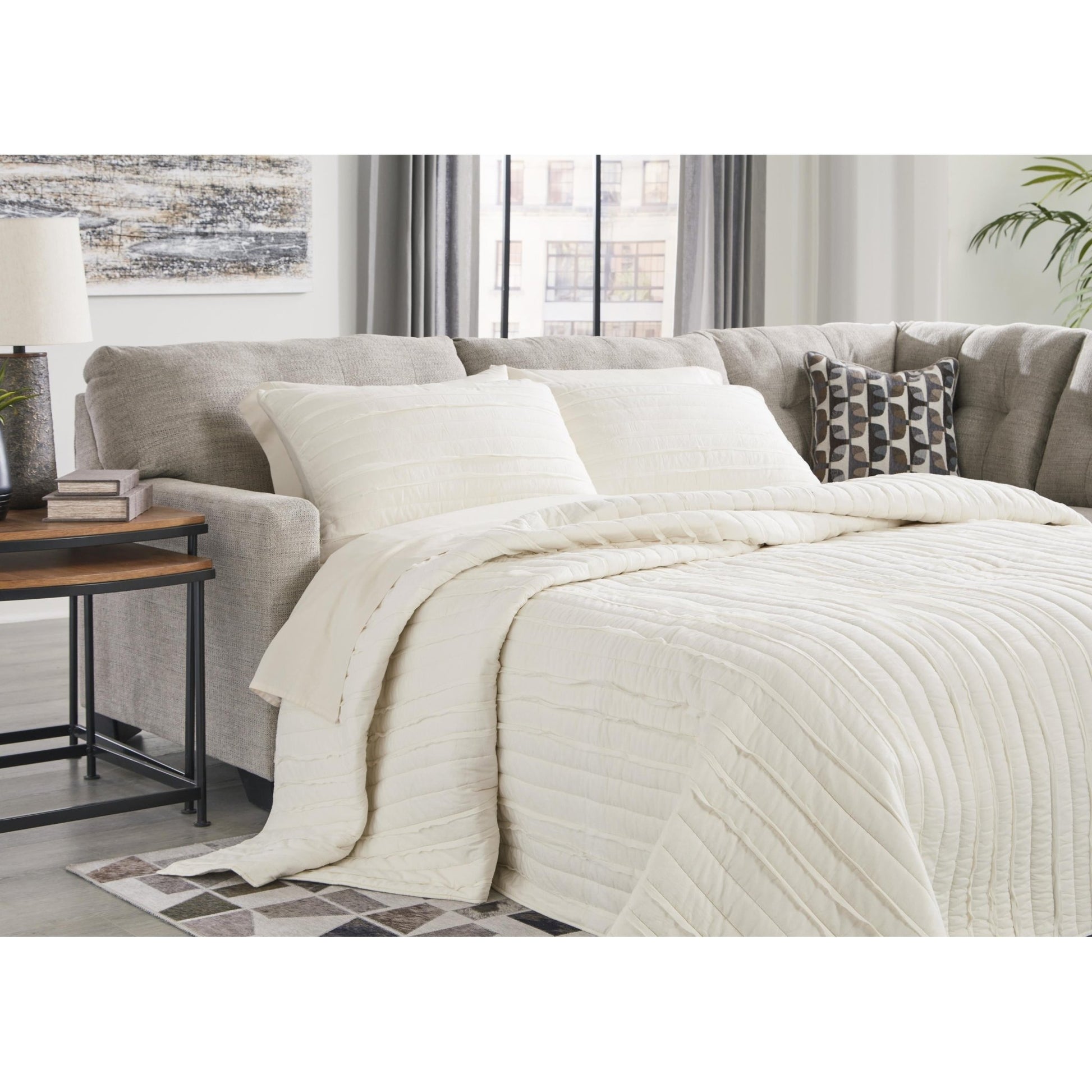 Signature Design by Ashley Mahoney 31004S4 2 pc Sleeper Sectional with Chaise - American Furniture of Slidell