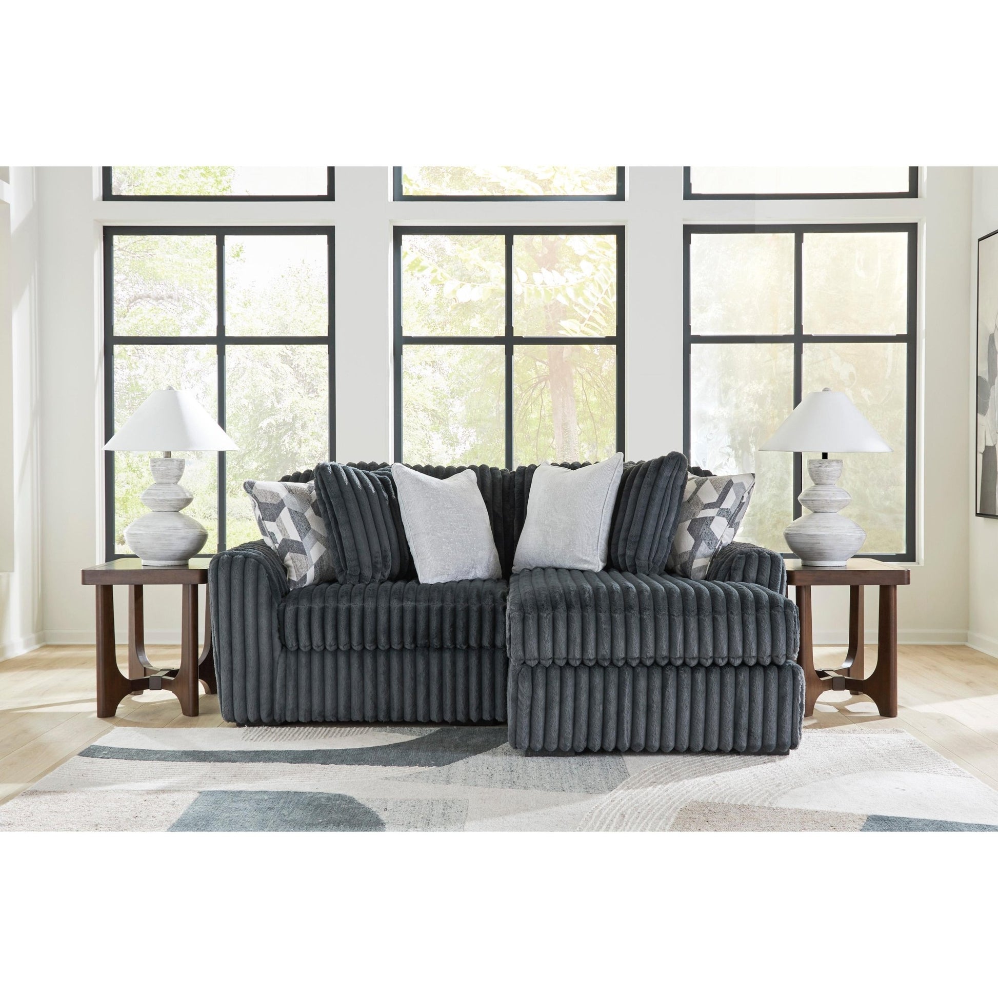 Signature Design by Ashley Midnight - Madness 98105S16 2 pc Sectional with Chaise - American Furniture of Slidell