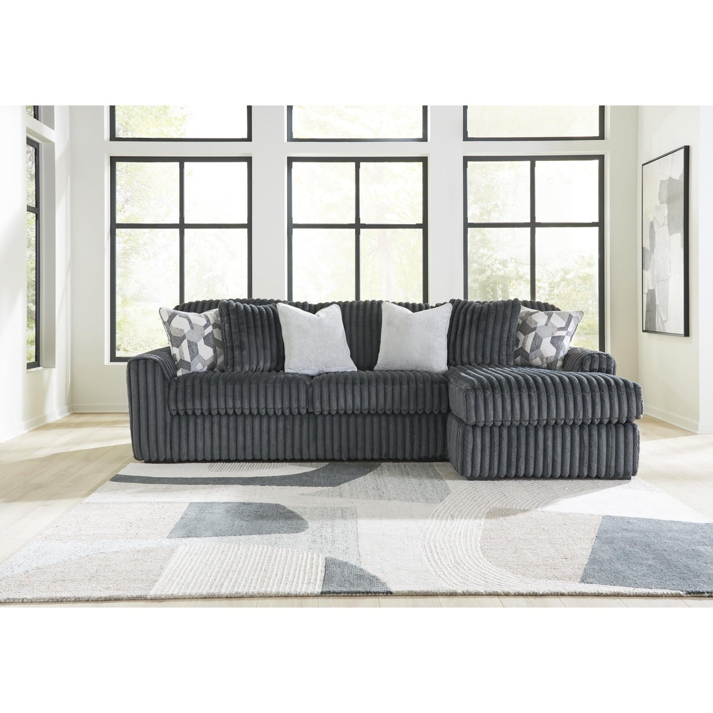 Signature Design by Ashley Midnight - Madness 98105S3 2 pc Sectional Sofa Chaise - American Furniture of Slidell
