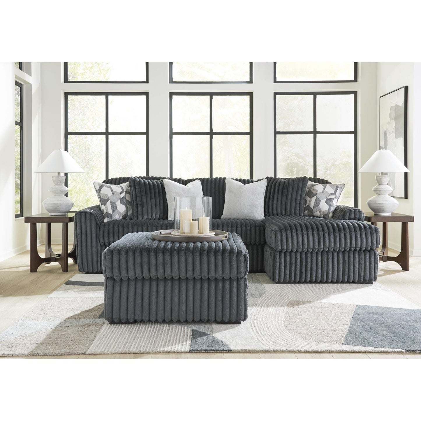 Signature Design by Ashley Midnight - Madness 98105S3 2 pc Sectional Sofa Chaise - American Furniture of Slidell