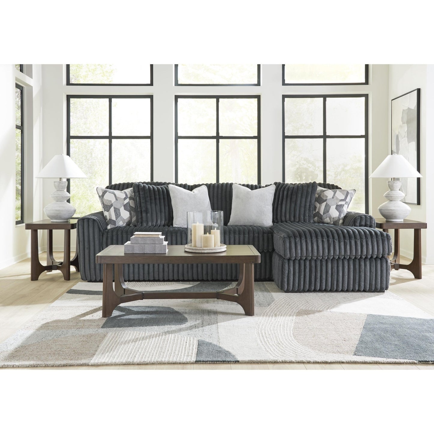 Signature Design by Ashley Midnight - Madness 98105S3 2 pc Sectional Sofa Chaise - American Furniture of Slidell