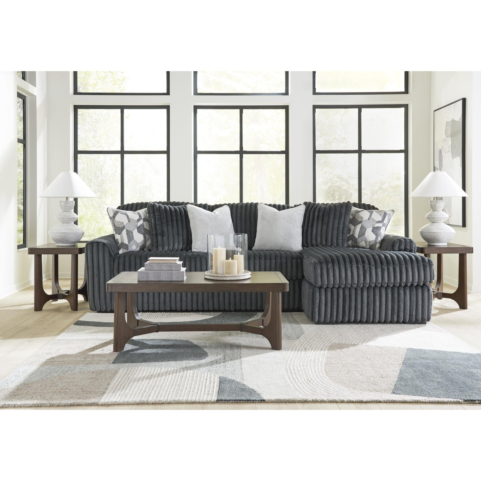 Signature Design by Ashley Midnight - Madness 98105S3 2 pc Sectional Sofa Chaise - American Furniture of Slidell