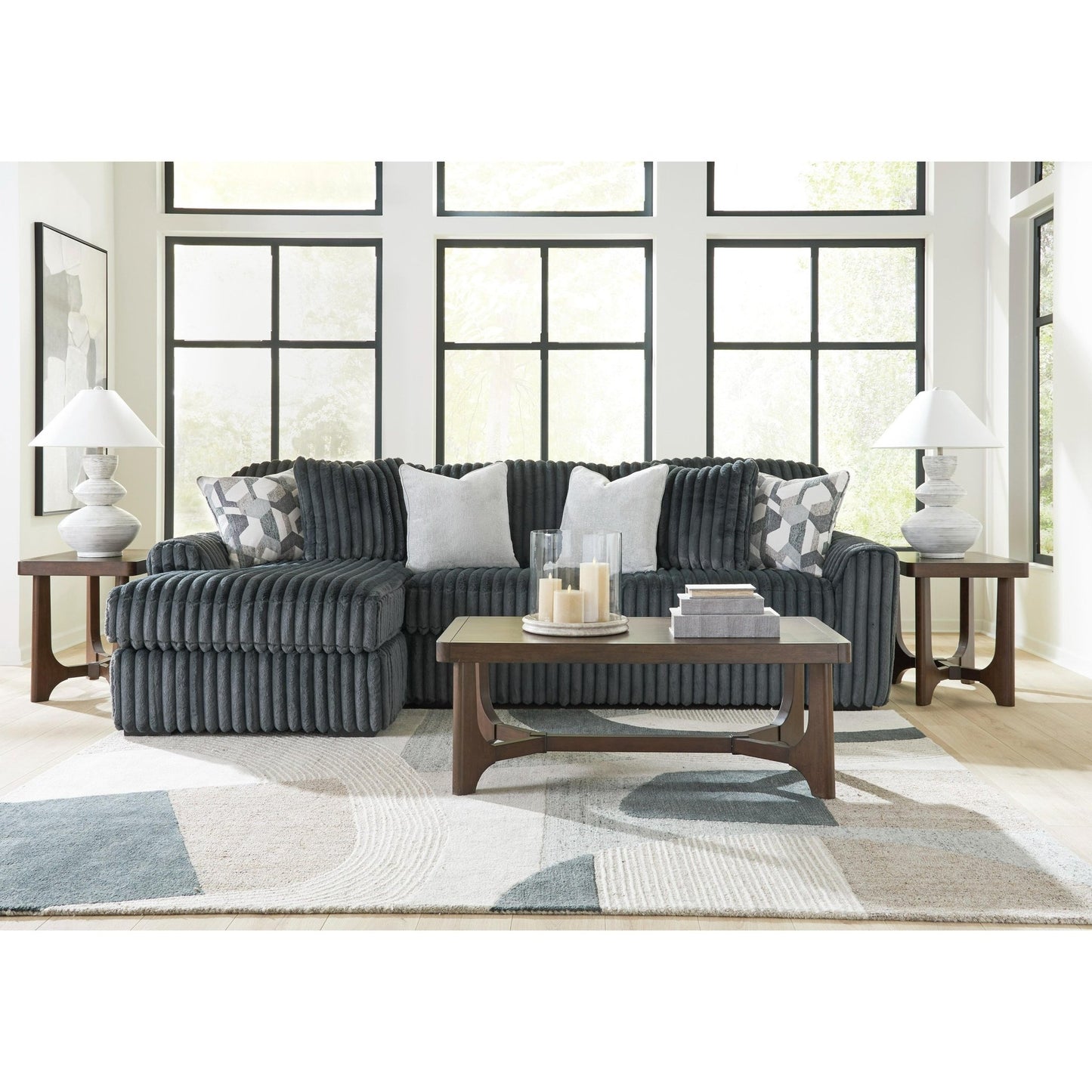 Signature Design by Ashley Midnight - Madness 98105S4 2 pc Sectional Sofa Chaise - American Furniture of Slidell