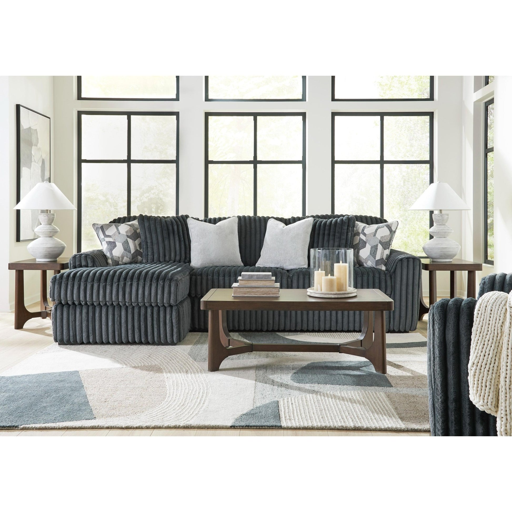 Signature Design by Ashley Midnight - Madness 98105S4 2 pc Sectional Sofa Chaise - American Furniture of Slidell