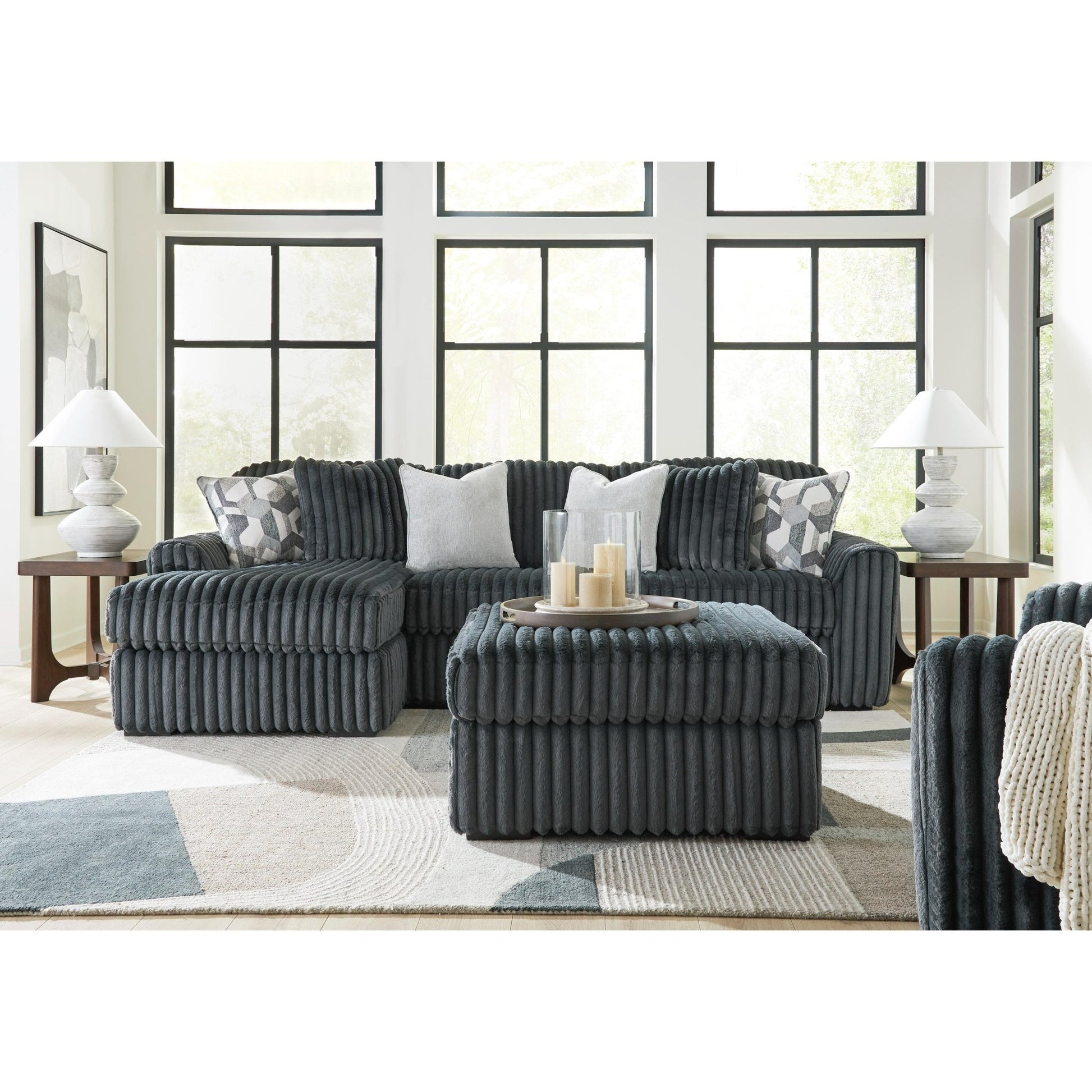 Signature Design by Ashley Midnight - Madness 98105S4 2 pc Sectional Sofa Chaise - American Furniture of Slidell