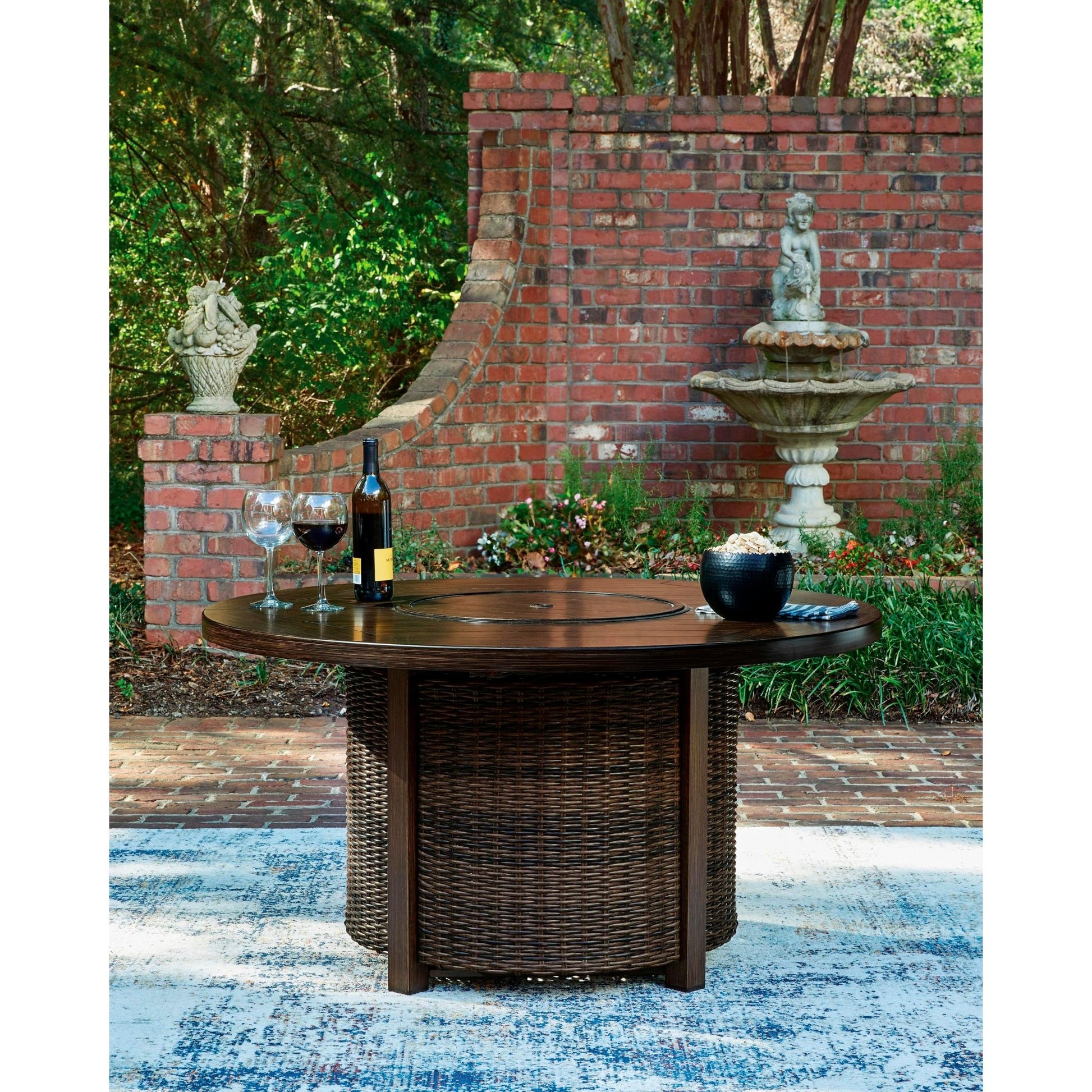 Signature Design by Ashley Monterey Point PCP760 - 776 Round Fire Pit Table - American Furniture of Slidell