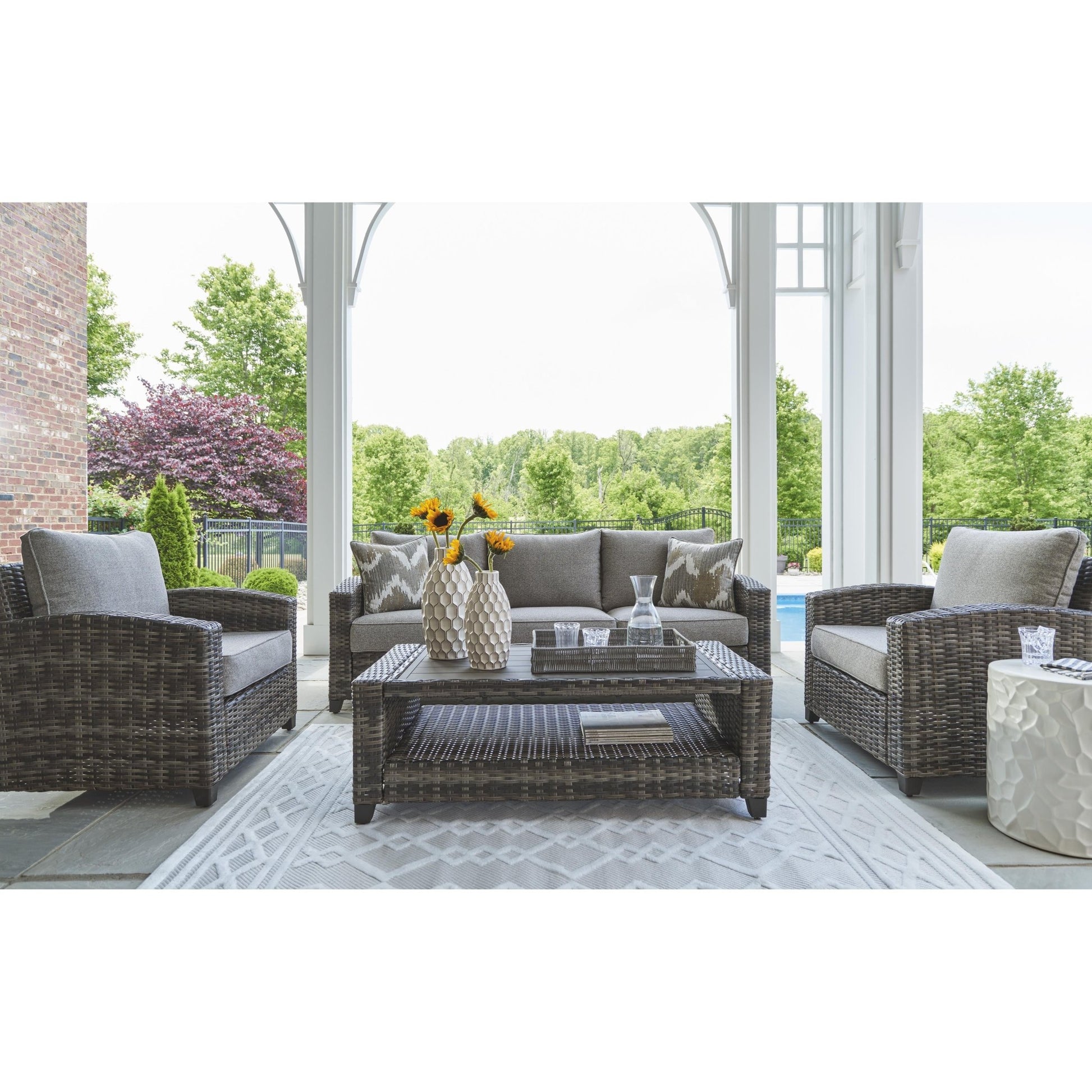 Signature Design by Ashley Oasis Court P335 - 081 Sofa/Chairs/Table Set - American Furniture of Slidell