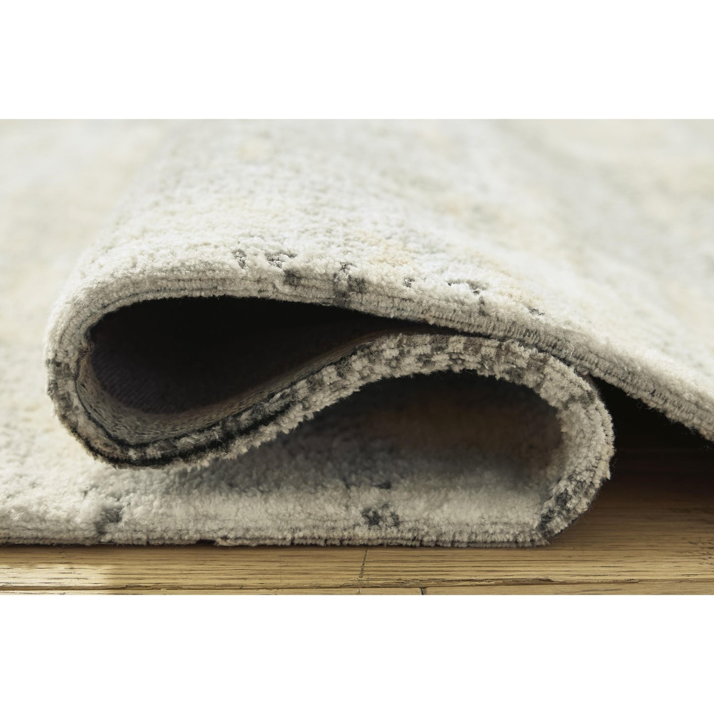 Signature Design by Ashley Raif R408081 Large Rug - American Furniture of Slidell