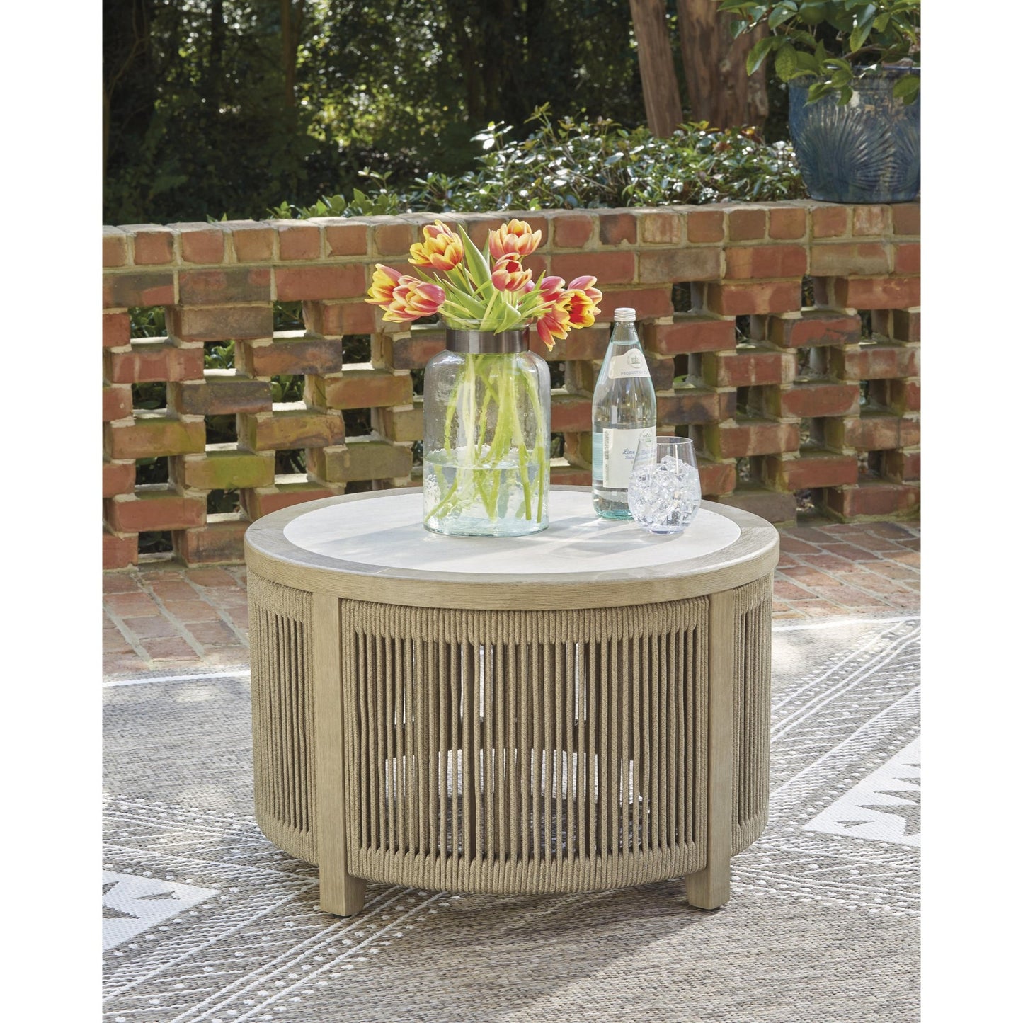 Signature Design by Ashley Spooners Cove PCP469 - 708 Round Cocktail Table - American Furniture of Slidell
