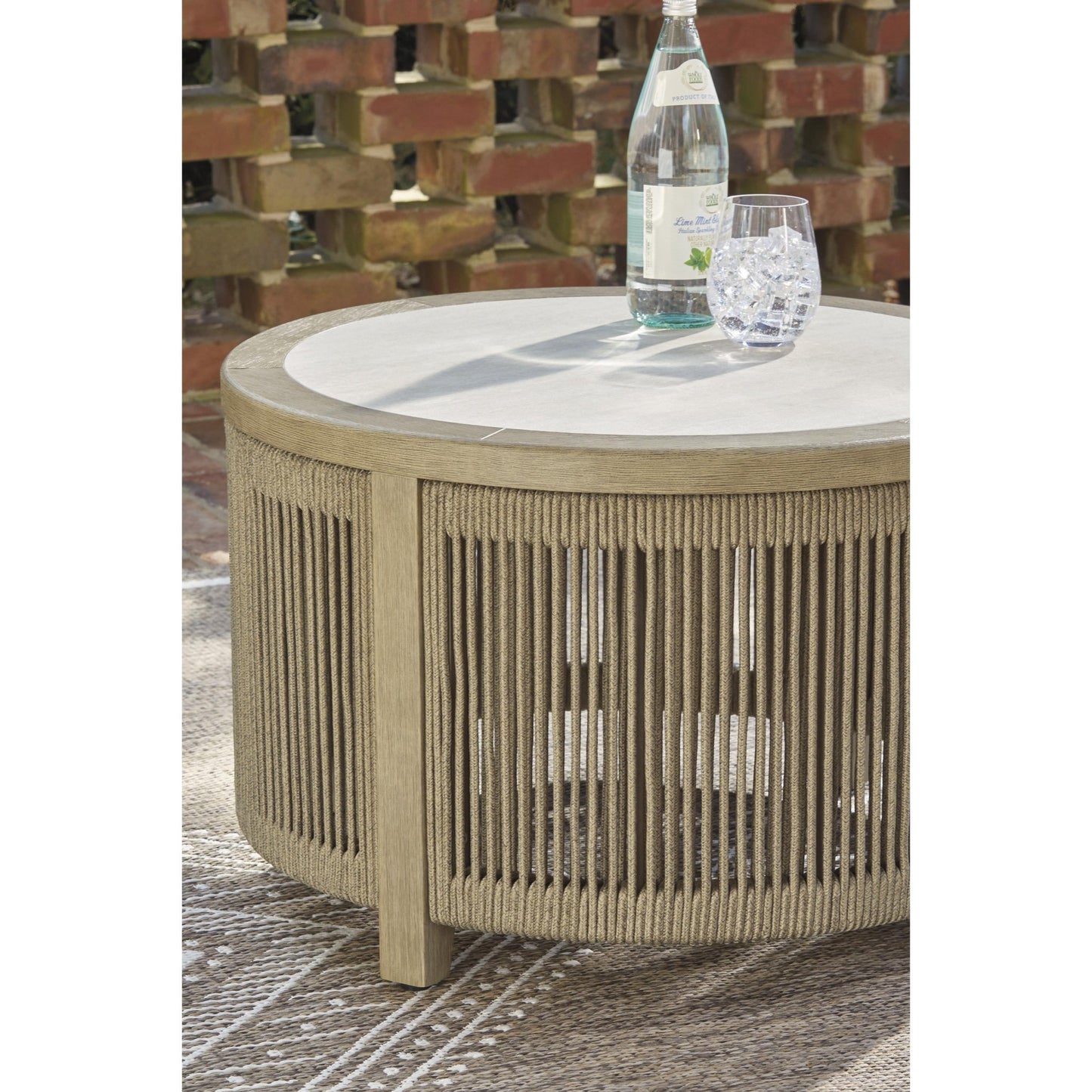 Signature Design by Ashley Spooners Cove PCP469 - 708 Round Cocktail Table - American Furniture of Slidell