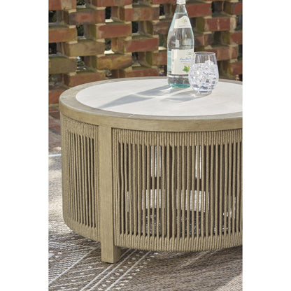 Signature Design by Ashley Spooners Cove PCP469 - 708 Round Cocktail Table - American Furniture of Slidell