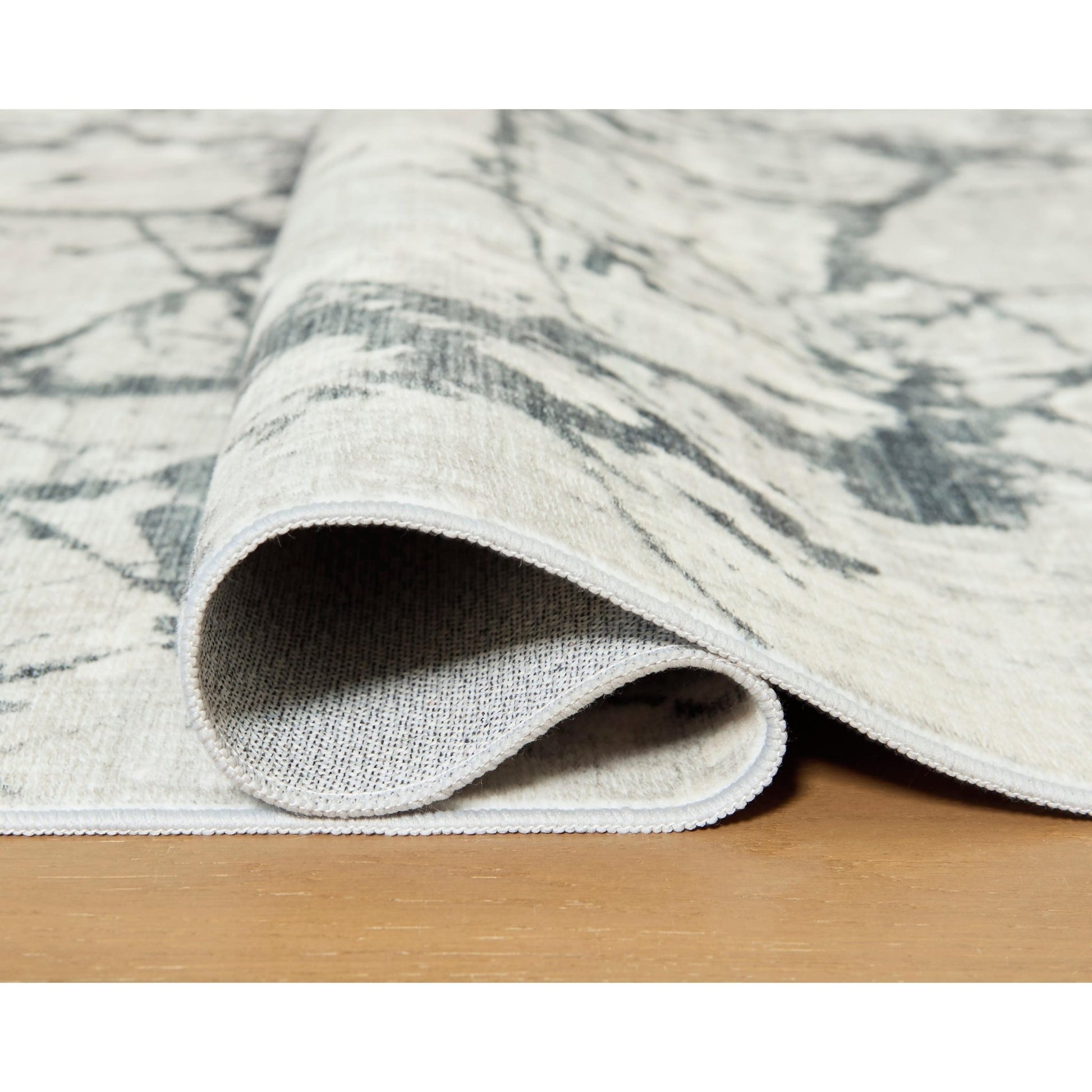 Signature Design by Ashley Tobinbury R407422 Washable Medium Rug - American Furniture of Slidell