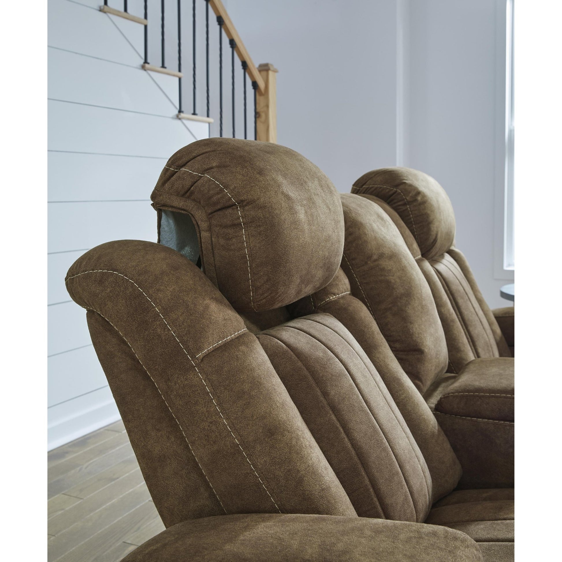 Signature Design by Ashley Wolfridge 6070318 Power Reclining Loveseat with Console and Adjustable Headrest - American Furniture of Slidell